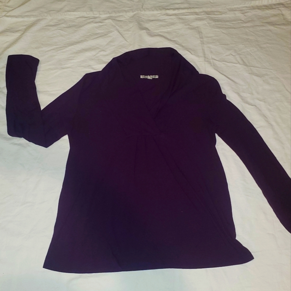 Carolyn Taylor purple top, sweater